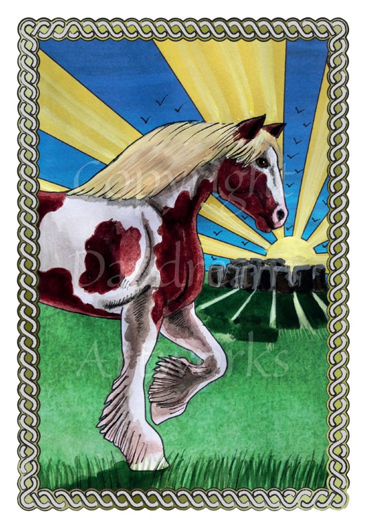 A piebald shire horse walks on grass across the design from the left. Rays of the sun radiate outwards against a deep blue sky, and through a circle of stones in the distance.  A twisted rope border surrounds the design.