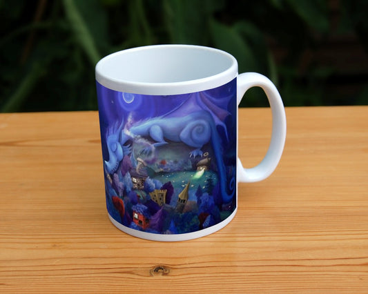 Painting of a blue dragon with rounded body shape and features sleeps on a hill, his head and tail draped down either side. Sheep graze on the hill. At the bottom of the hill lies a village with colourful trees, houses and castle. A crescent moon shines overhead.