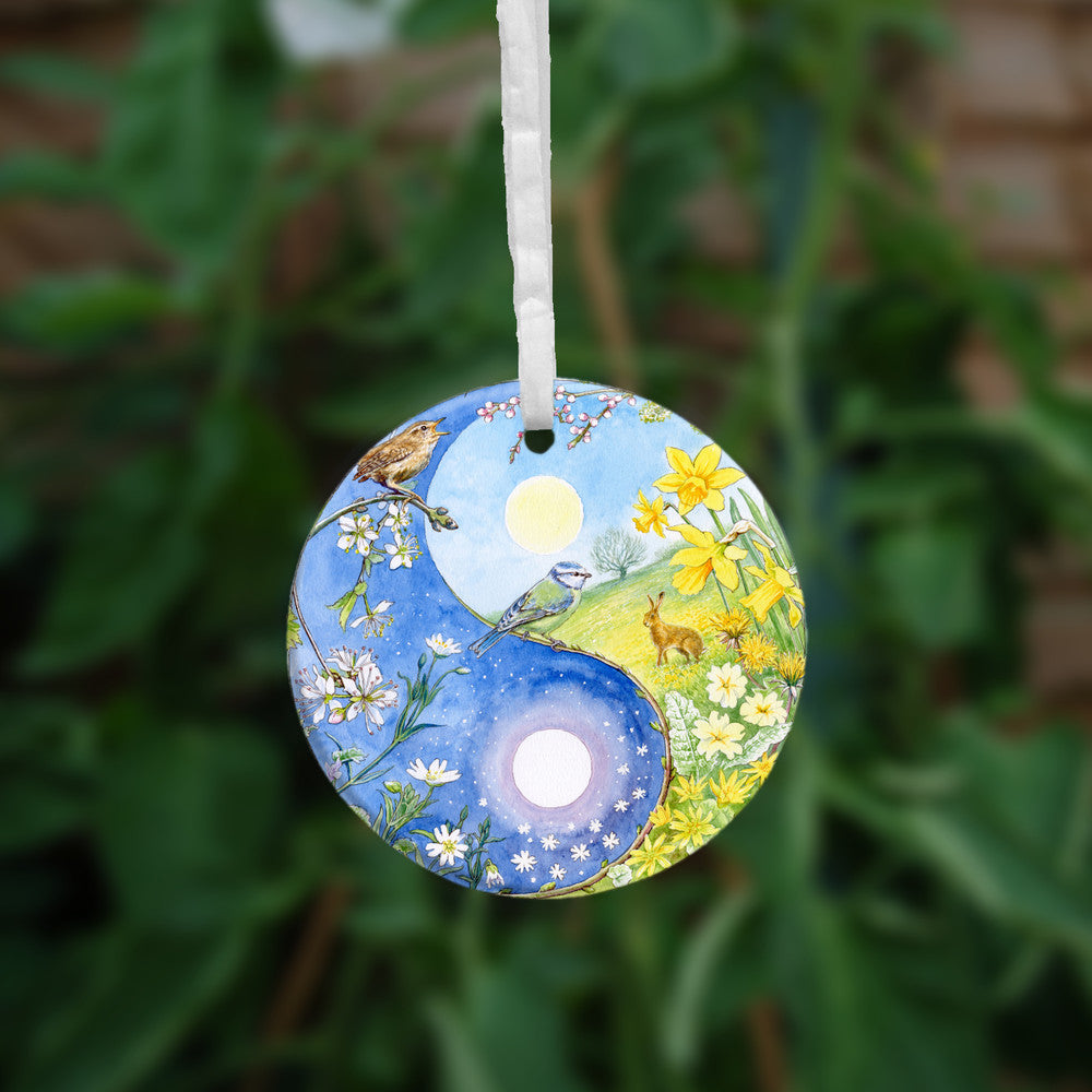 A close-up of the other side, just showing the central circle of the design without the outer details.