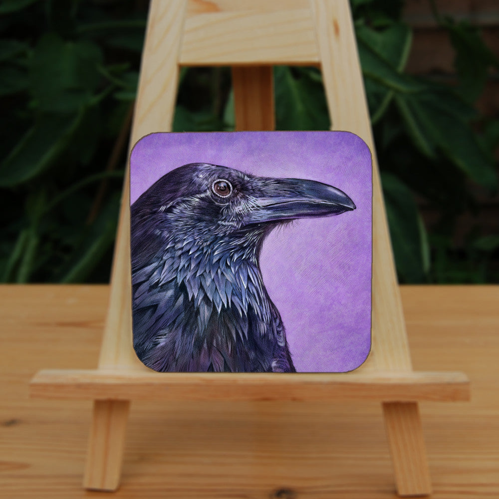 A side view of the head and neck of a raven with lots of feather detail. The raven is coloured black with purple shading, and the background is mottled purple.