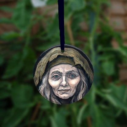 The second side of the ornament showing a close-up of the woman's face.
