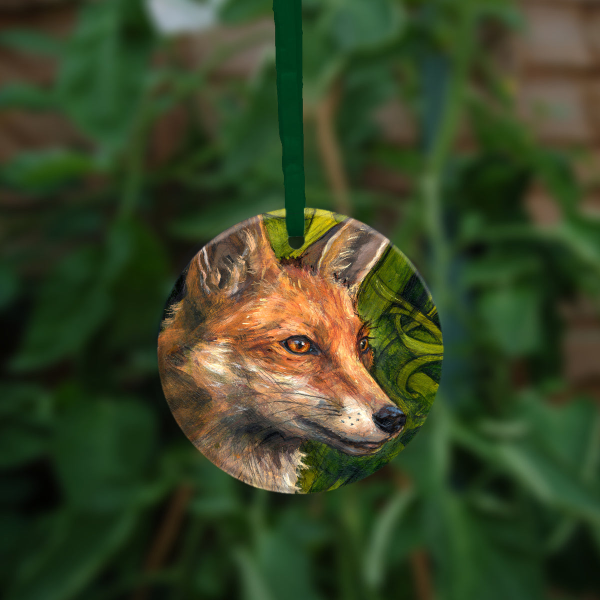 The second side of the ornament showing a close-up of the fox's head.