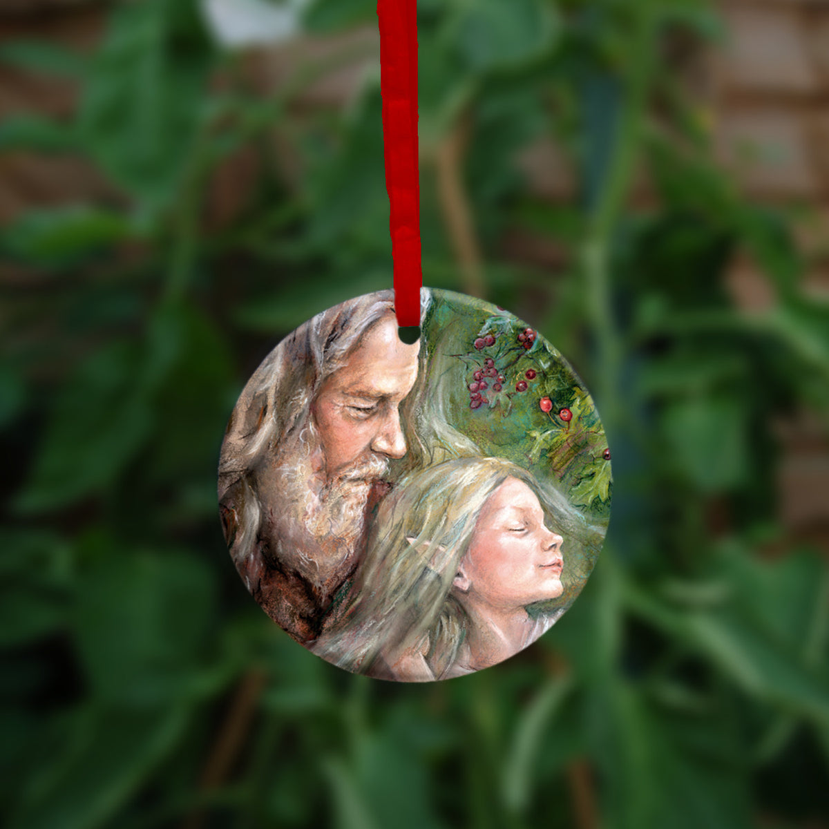 The other side of the ornament, showing a closer view of the man and fairy.