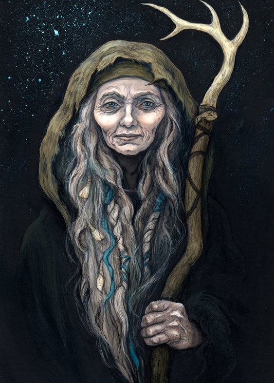 An older woman with blue eyes stands facing the viewer. Her head is covered by a brown hood, and her long grey hair, some of it braided with blue braid, falls down below her face. She holds a staff, topped with a deer antler, upright in one hand. A sea of stars shine behind her.