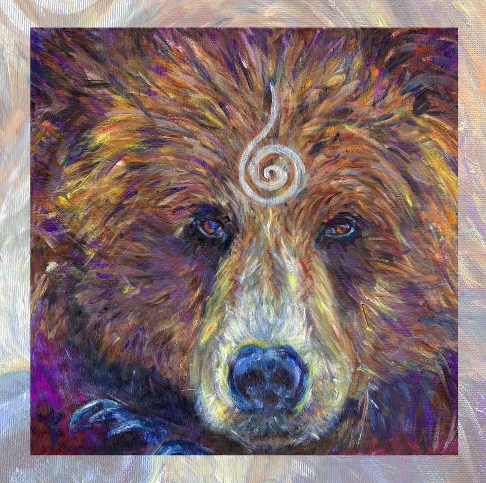 The head of a bear looking directly at the viewer. A pale-coloured spiral is coiled at their forehead, opening upwards. Their fur is a mixture of reds, golds and browns, with a pale nose.