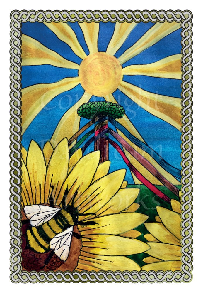 A bee sits on a yellow flower at the bottom left of the design. The sun shines against a deep blue sky at the top. A maypole, colourful streamers flowing outwards, stands in the centre. A twisted rope border surrounds the design.