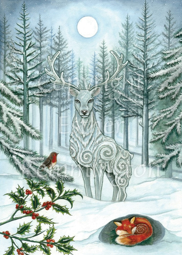 A blue-white stag with large swirls in his coat stands in snow facing the viewer. Snow-covered fir trees spread out behind him, and a full moon shines overhead in a gap between the trees. A branch of berried holly can be seen on the bottom left, with a robin sitting on a fir tree branch above it. To the bottom right, a red fox sleeps curled up under the snow. The overall colours are pale to mid-blue and teal, with splashes of red and green.
