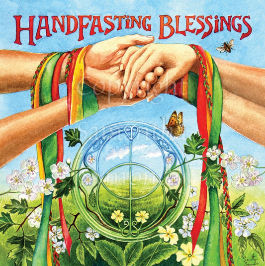 Two pairs of hands, wrapped in a ceremonial binding in red, orange and green, hold each other over a Chalice Well symbol. Around the symbol are spring flowers and leaves, and a butterfly perches on it. "Handfasting Blessings" is written across the top of the design, in red text. In the background are green fields and a blue sky.