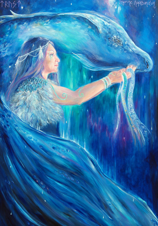 A woman with long blue hair stands in front of a blue dragon. Both look to the right. A wing wraps around one side, with the head on the other. The woman holds what appear to be strands of blue ribbon in her outstretched hand. The overall design colour is blue.