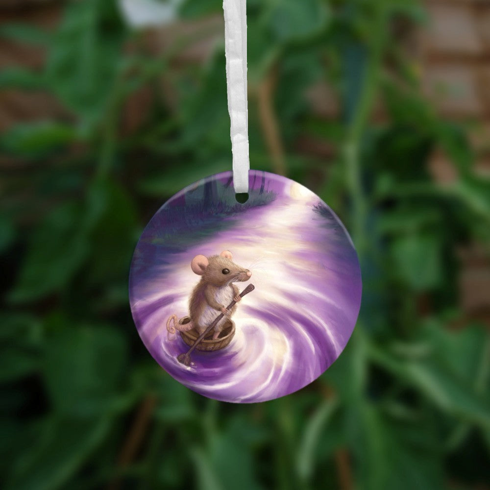 A cute brown mouse, standing in half a nut shell and holding a twig shaped like an oar, drifts down a stream towards a bright light. Trees line either side of the stream. Colours are purples and greens.