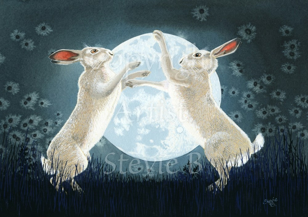 Two pale brown hares box with the full moon behind them. Grass and sky provide the background, in subdued night-time blues.